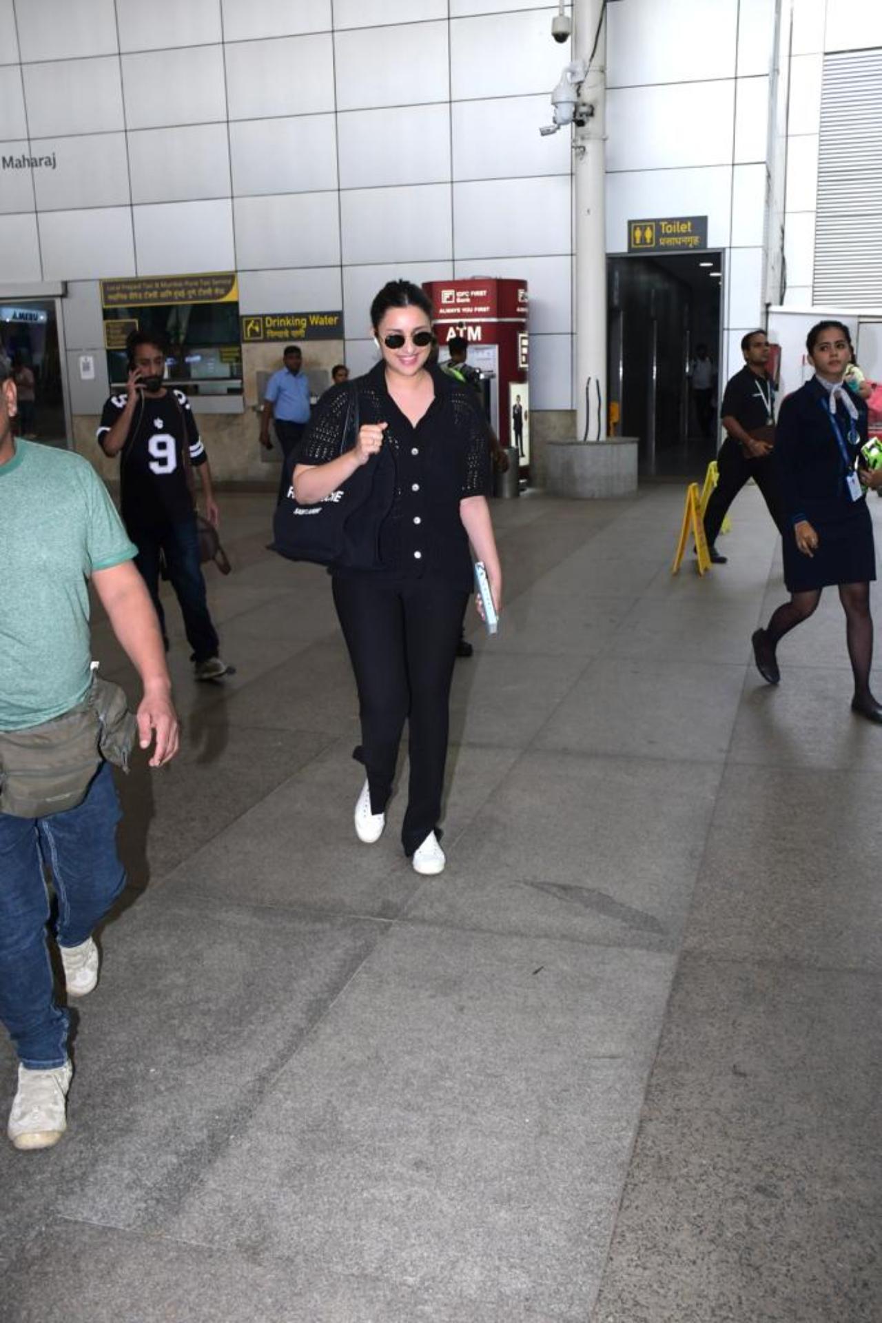 Actress Parineeti Chopra opted for an all-black look as she was clicked at the airport
